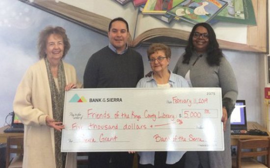 Carol Dias, second from left, was re-elected as president of the Friends of the Kings County Library. In this file photo she is show with Mark Ulibarri, Wilma Humason and Natalie Rencher.